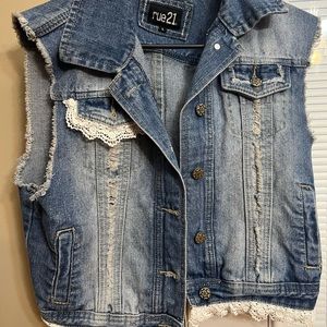 Denim vest with lace embellishments